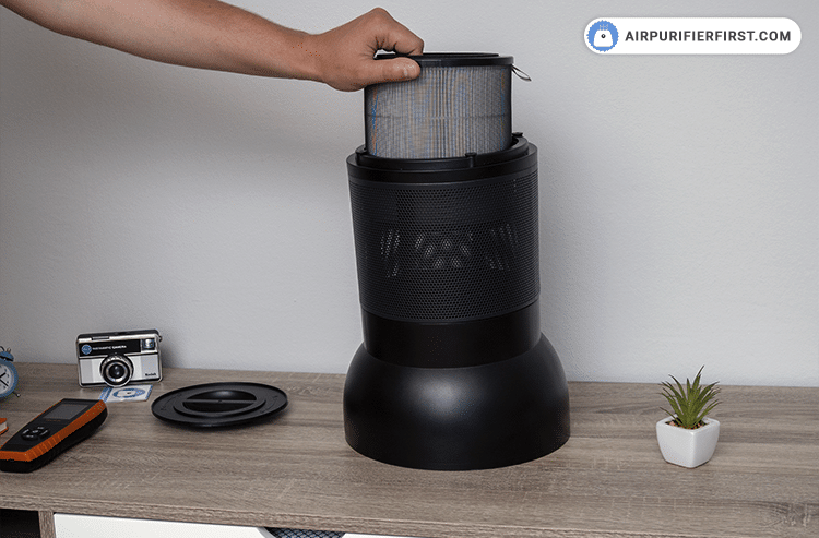 After unscrewing the cover from the bottom, remove the old filter from the appliance.