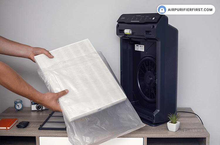 The last step is to remove the new filters from the protective plastic wrap and then insert it into the device. The True HEPA filter goes first, and after it is the AOC Carbon filter.