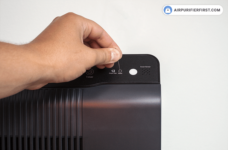 After replacing the filters, turn the power onto the unit and then use a thin object, such as a paper clip, and press the 